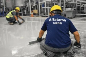 aplikator epoxy lantai pabrik mengerjakan epoxy self leveling